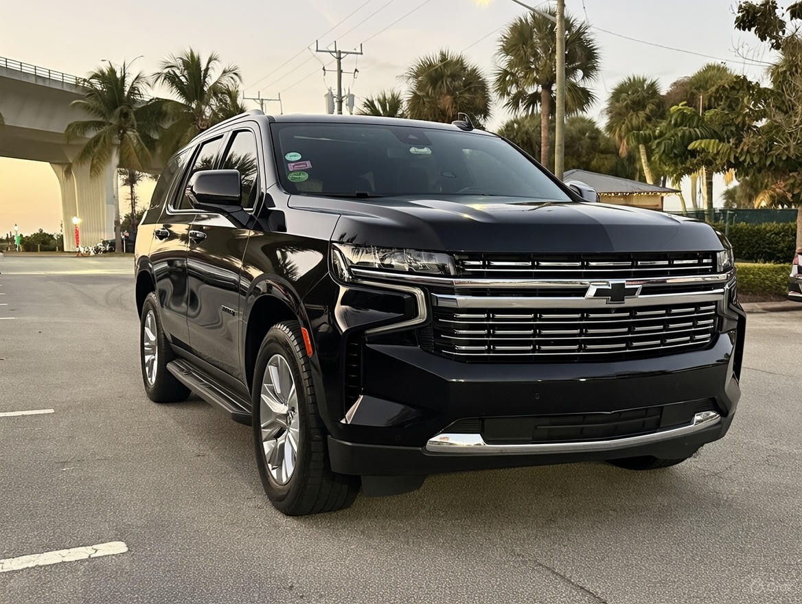 Chauffeur vs limo vs black car: the Elite Coastal Rides black Chevrolet Tahoe premium SUV