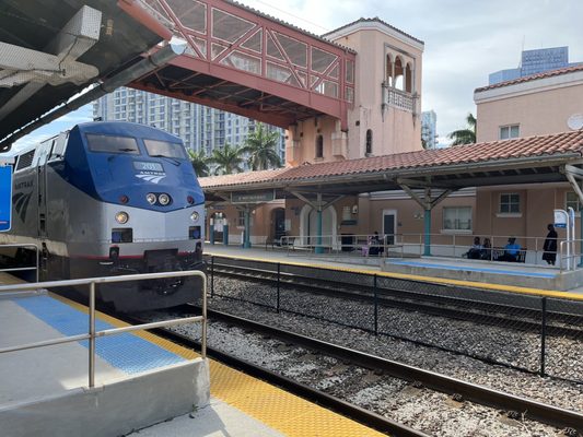 Amtrak car service pickup as an Amtrak train arrives at the West Palm Beach station platform